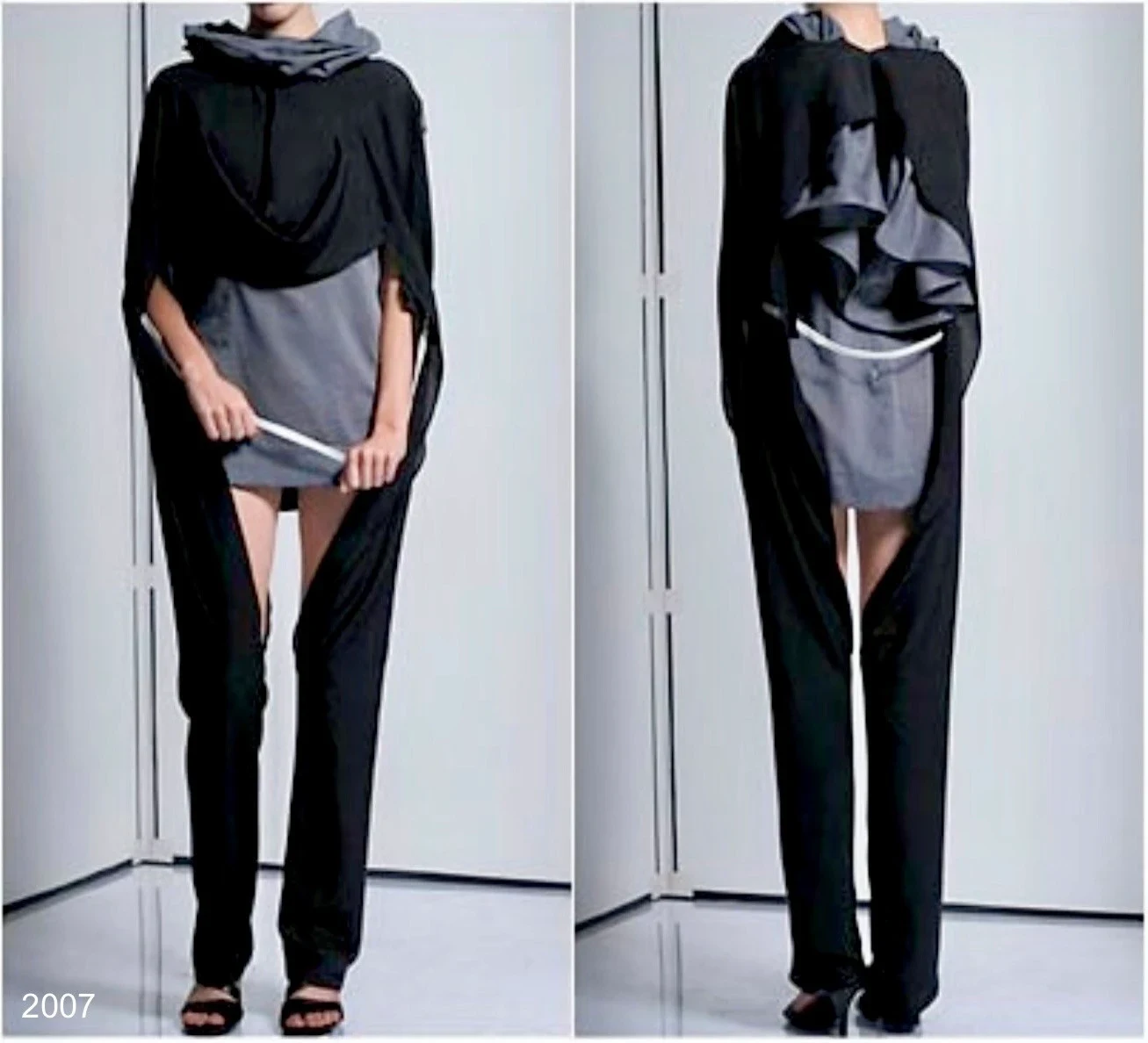 Front and rear views of a black garment with pale draped panels.